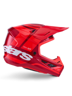 Alpinestars S-M7 Core helm, motorcrosshelm, glanzend rood met donkerrode accenten en witte branding, zijaanzicht met groot wit stars-logo, aerodynamische schaal met mesh ventilatieopeningen en een opvallende klep