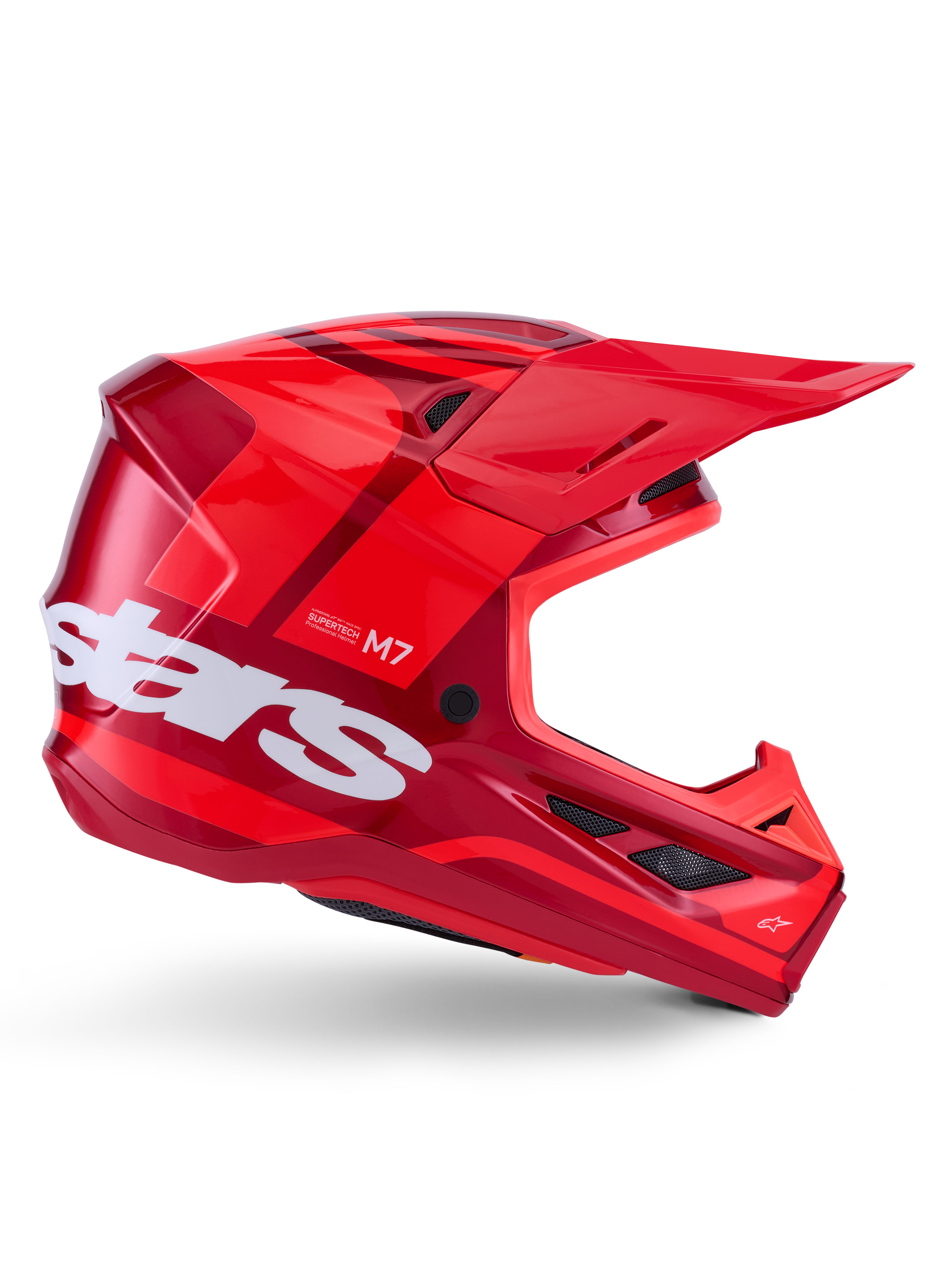 Alpinestars S-M7 Core Helm, Motocross-Helm, Rot glänzend mit dunkelroten Akzenten und weißem Branding, Seitenansicht mit großem weißem Stars-Logo, aerodynamische Schale mit Mesh-Belüftungsöffnungen und einem markanten Visier