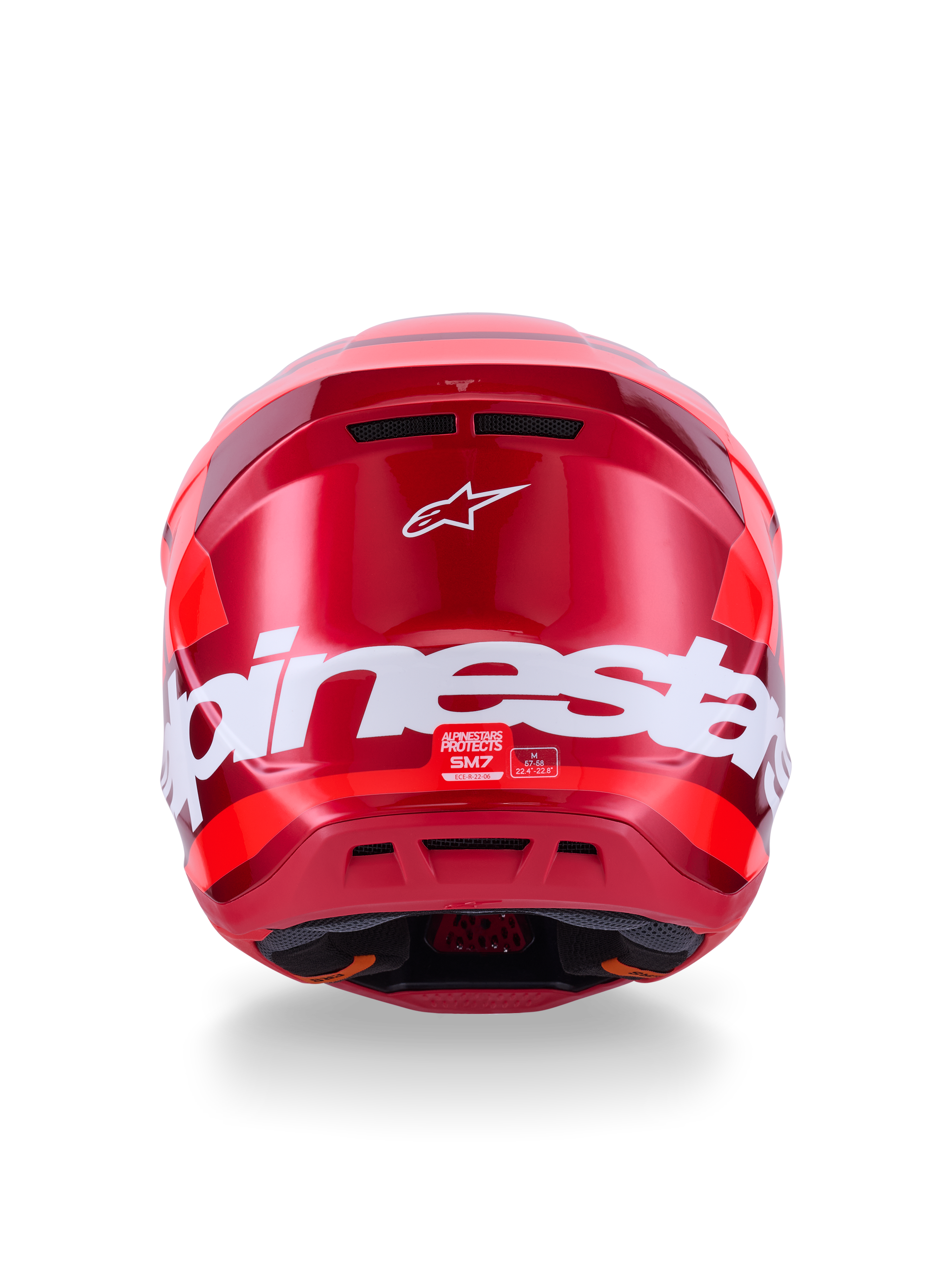 Alpinestars S-M7 Core Helm, glanzend rood, achteraanzicht met grote witte Alpinestars branding, aerodynamische schaal met geïntegreerde ventilatieopeningen, professionele motorcross hoofdbescherming