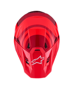 Alpinestars S-M7 Core Helm, Red Glossy, bovenaanzicht met aerodynamische schaal met donkerrode accenten, wit A-star-logo op het vizier, geïntegreerde ventilatieopeningen, hoogwaardige motorcross beschermende uitrusting