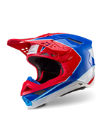 Casque Alpinestars Supertech M10 Aeon, casque de motocross, rouge et bleu brillant, vue de trois-quarts montrant la coque aérodynamique avec de multiples orifices de ventilation, accents graphiques blancs et rouges, logo Alpinestars sur la visière et le côté, équipement de course tout-terrain professionnel