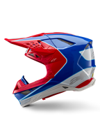 Casque Alpinestars Supertech M10 Aeon ECE 22.06, casque de motocross, rouge vif et bleu brillant, vue de profil, coque multi-composite aérodynamique avec orifices de ventilation intégrés et design graphique rouge et bleu, finition brillante pour la course tout-terrain