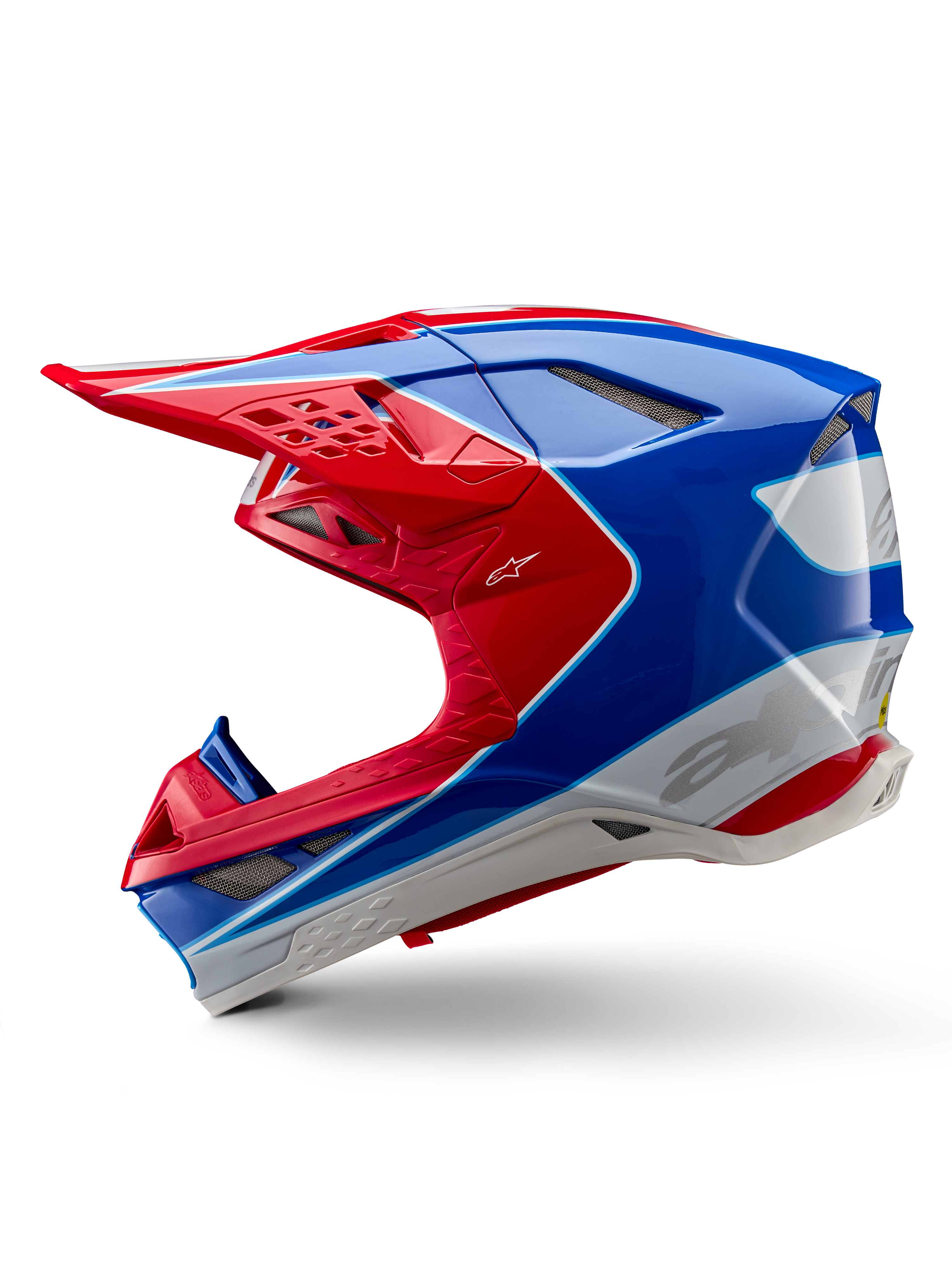 Casque Alpinestars Supertech M10 Aeon ECE 22.06, casque de motocross, rouge vif et bleu brillant, vue de profil, coque multi-composite aérodynamique avec orifices de ventilation intégrés et design graphique rouge et bleu, finition brillante pour la course tout-terrain