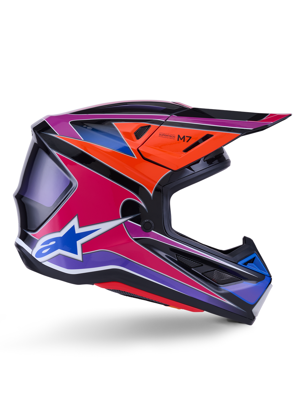 Alpinestars S-M7 Fuse Helm, Motocross-Helm, Blau, Lila und Pink glänzend, Seitenprofilansicht mit lebendigen Racing-Grafiken, aerodynamisches Schalendesign mit Belüftungsöffnungen und Alpinestars-Stern-Logo