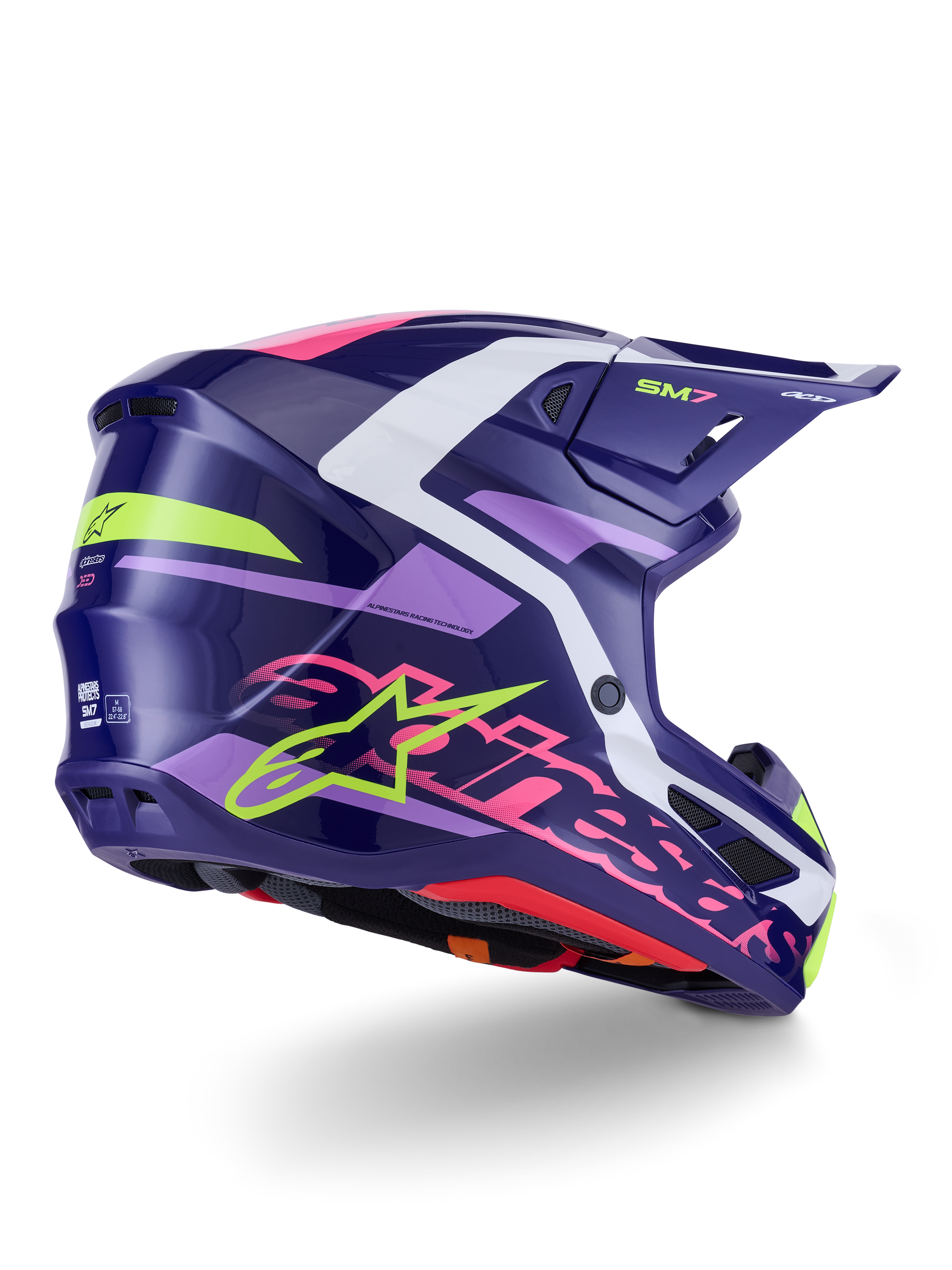 Alpinestars S-M7 Deed helm, motocrosshelm, glanzend paars roze, zij-achteraanzicht met witte en limegroene accenten, opvallend roze Alpinestars-woordmerk en sterlogo, aerodynamisch composiet schaalontwerp voor off-road prestaties