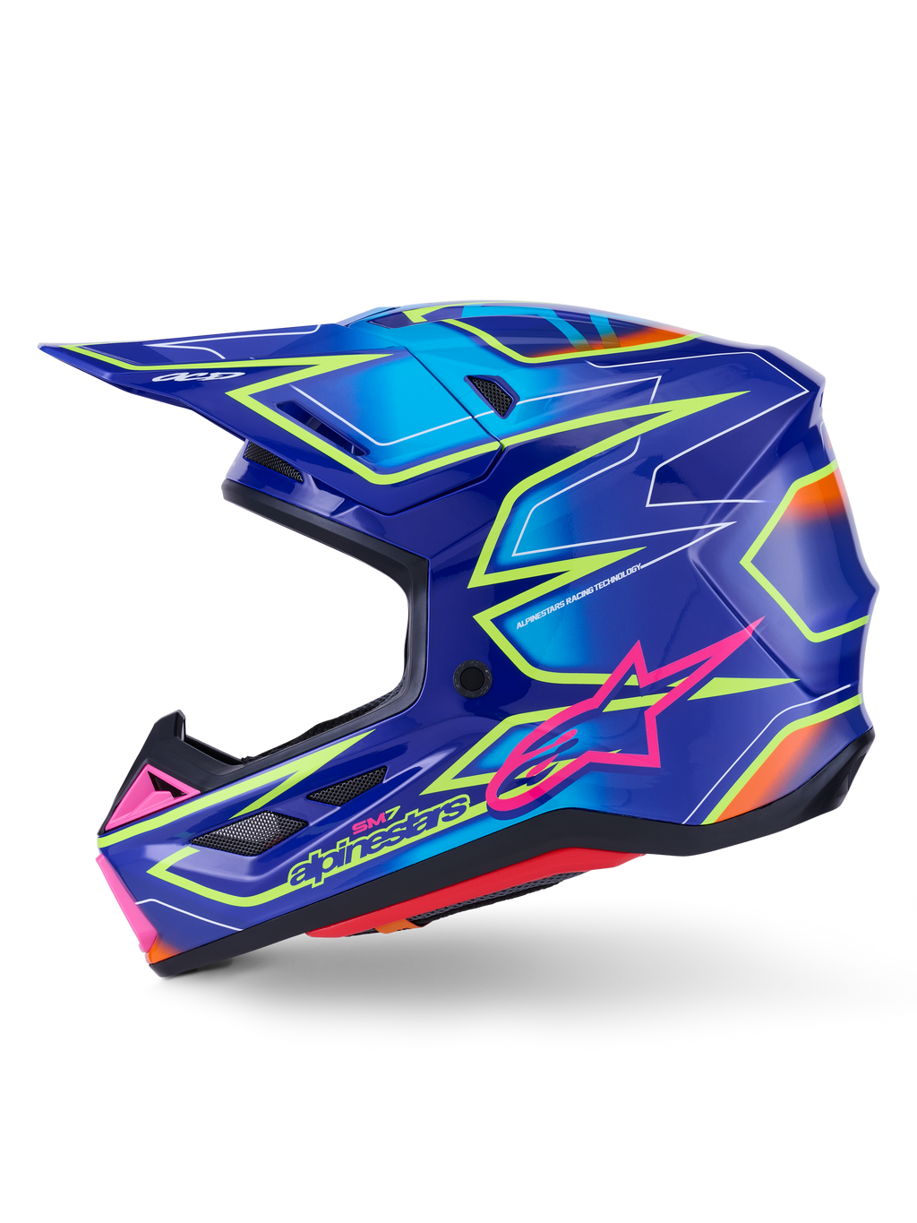 Casque Alpinestars S-M7 Cast, casque de motocross, bleu avec accents rose et jaune fluo brillants, vue de profil présentant la coque composite aérodynamique, les ports de ventilation intégrés, le logo étoile rose et le marquage jaune, conçu pour la protection en compétition tout-terrain.