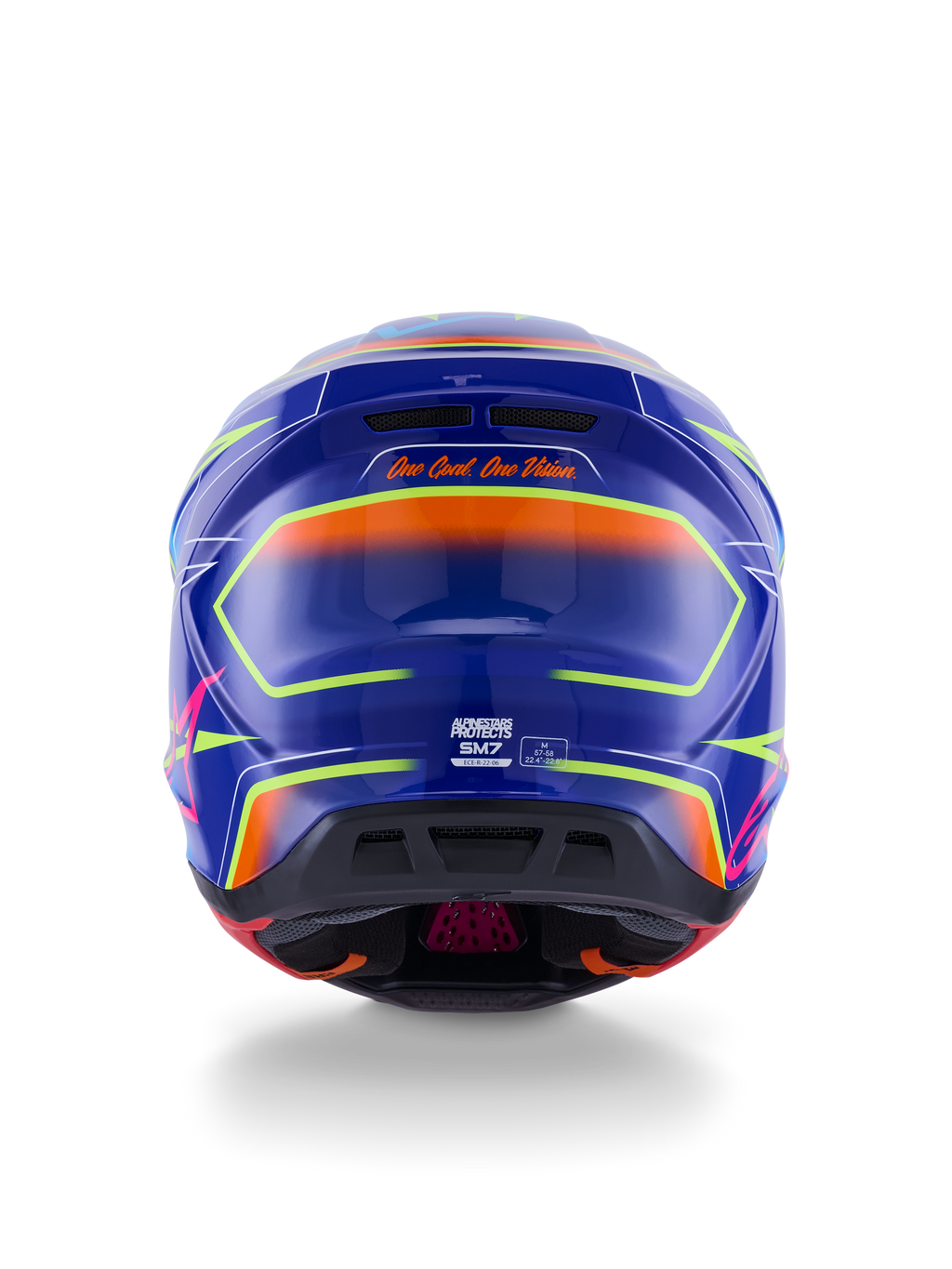 Casque Alpinestars S-M7 Cast ECE 22.06, casque de motocross, bleu, rose et jaune fluo brillant, vue arrière montrant le slogan 'One Goal. One Vision.', coque composite aérodynamique avec ports de ventilation intégrés et accents néon vibrants