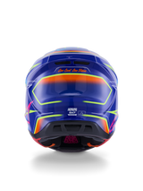 Alpinestars S-M7 Cast Helm ECE 22.06, motorcrosshelm, blauw, roze en fluogeel glanzend, achteraanzicht met de slogan 'One Goal. One Vision.', aerodynamische composietschaal met geïntegreerde ventilatieopeningen en levendige neon accenten
