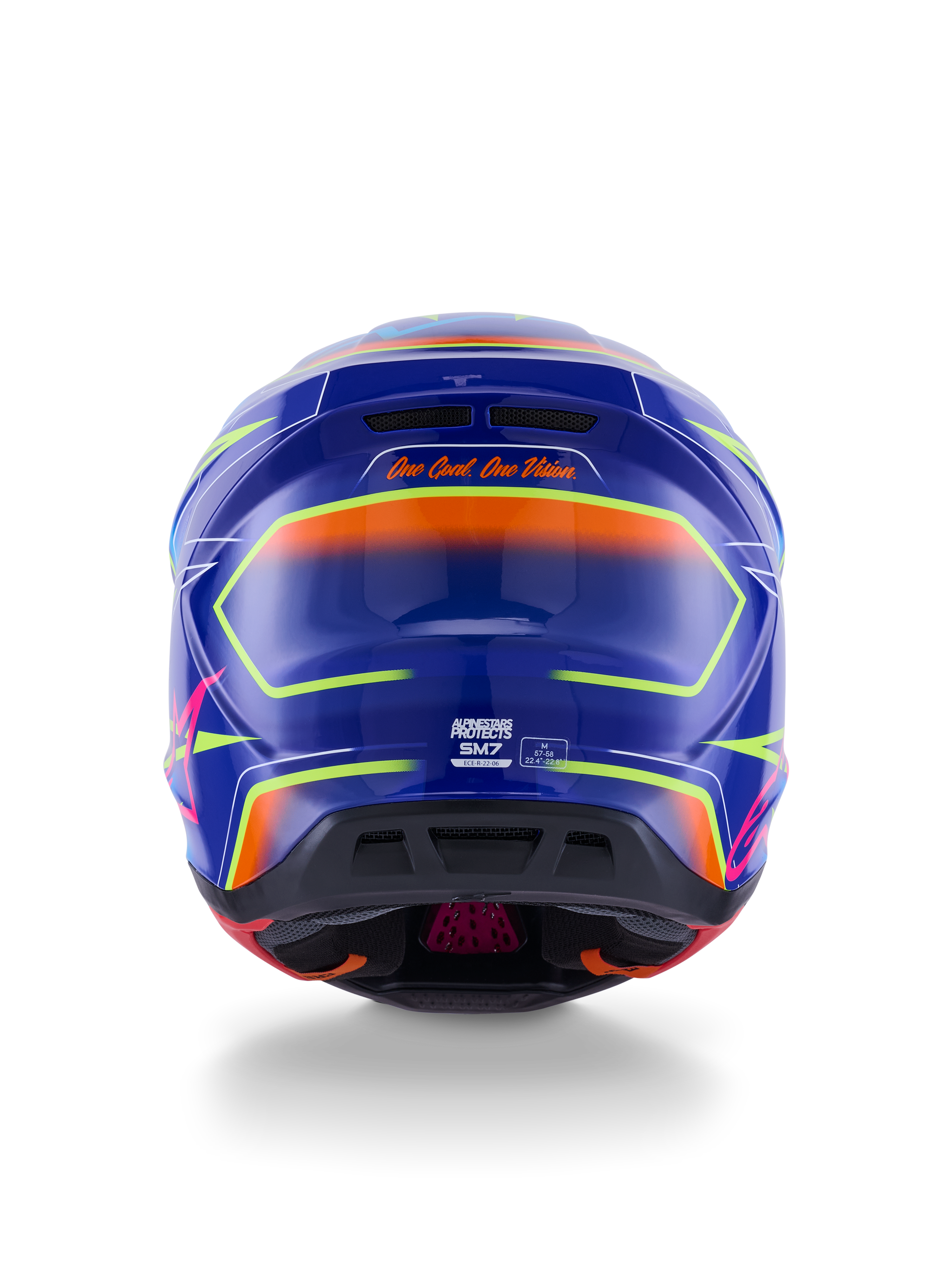Casque Alpinestars S-M7 Cast ECE 22.06, casque de motocross, bleu, rose et jaune fluo brillant, vue arrière montrant le slogan 'One Goal. One Vision.', coque composite aérodynamique avec ports de ventilation intégrés et accents néon vibrants