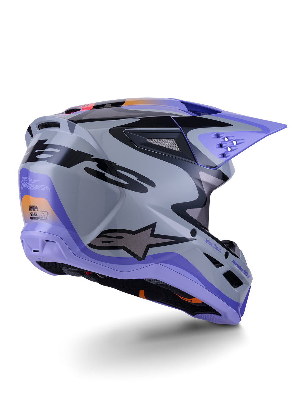 Alpinestars S-M3 Jettson ECE 22.06, casque de motocross, gris, violet et noir brillant, vue de trois-quarts arrière montrant la coque thermo-injectée aérodynamique avec des ports de ventilation et un design graphique audacieux