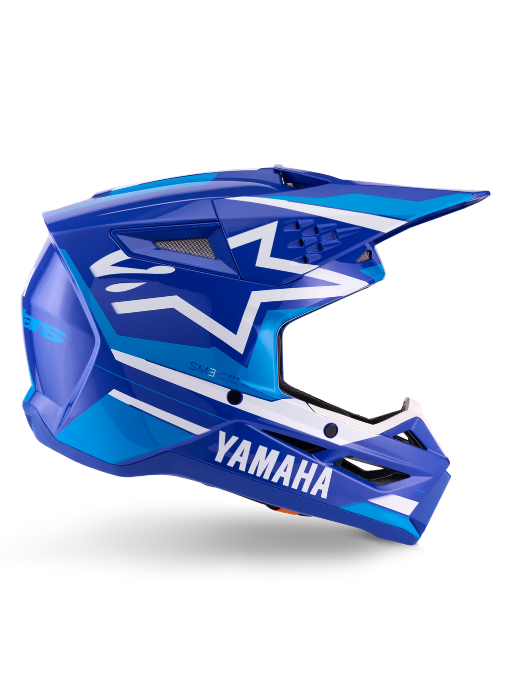 Alpinestars Yamaha S-M3 helm ECE 22.06, motorcrosshelm, blauw en wit glanzend, met opvallende Yamaha-branding en geometrische patronen, aerodynamisch ontwerp met zwarte mesh ventilatieopeningen en een puntig vizier, professionele off-road uitrusting