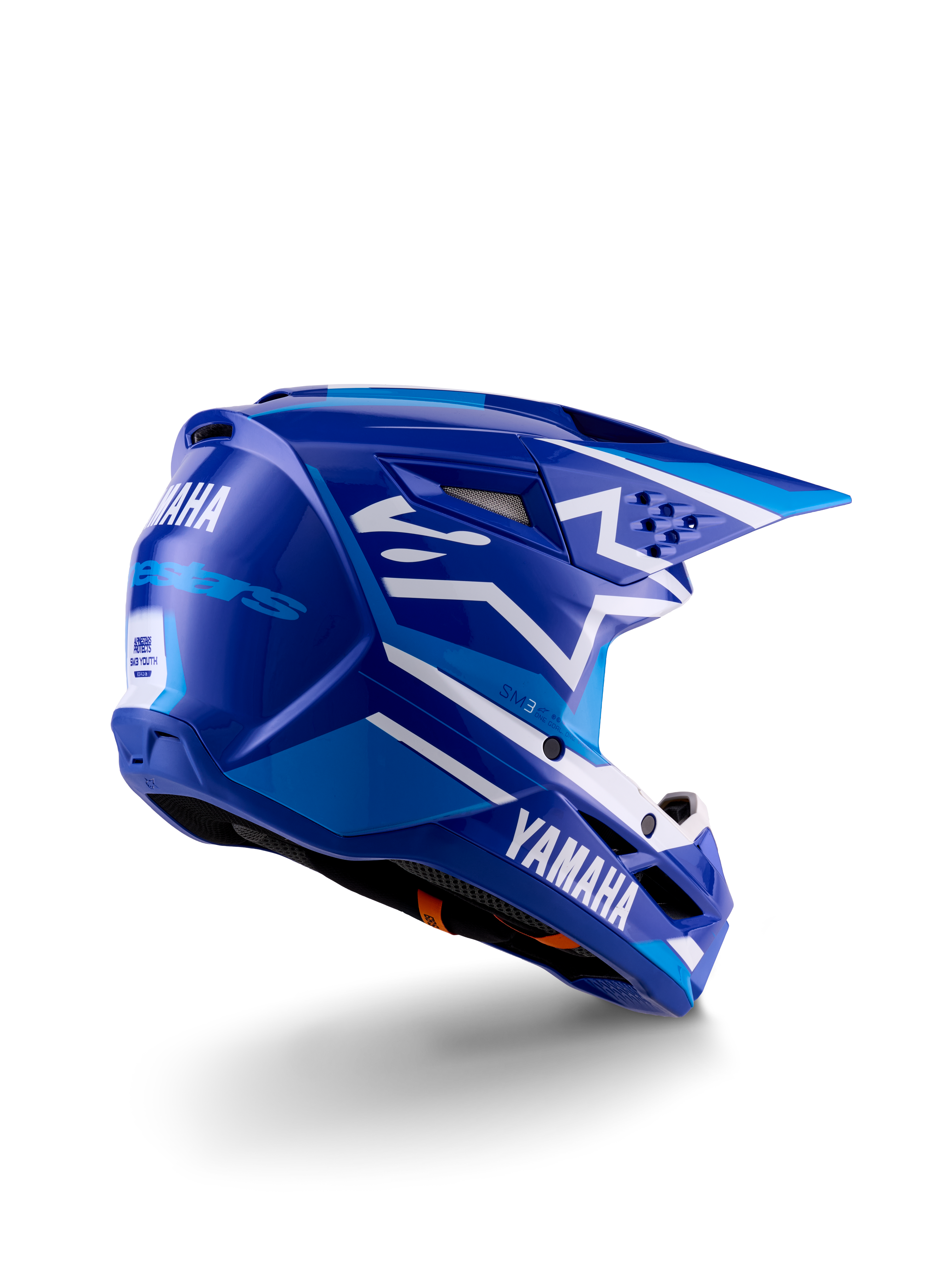 Casque de motocross Alpinestars Yamaha S-M3 Youth, bleu et blanc brillant, avec logo Yamaha imposant sur le côté et à l'arrière, coque aérodynamique avec ventilation arrière, protection de tête tout-terrain pour enfant, vue de trois-quarts arrière.