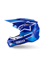 Casque de motocross Yamaha S-M3 Youth, casque de motocross, bleu blanc brillant, vue de profil, avec marquage Yamaha distinctif sur la mentonnière et logo étoile Alpinestars, coque aérodynamique avec plusieurs ports de ventilation et visière intégrée.