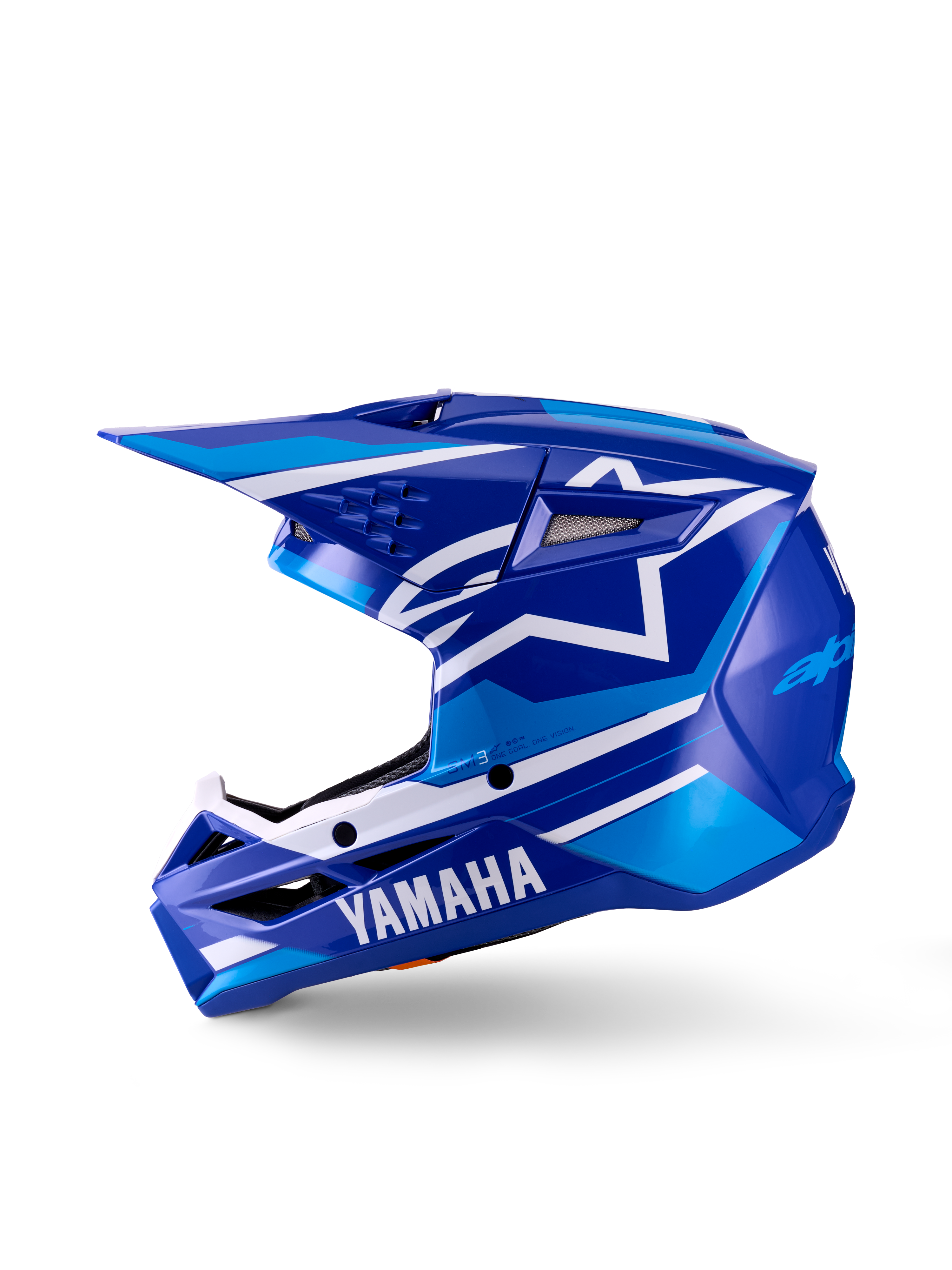 Casque de motocross Yamaha S-M3 Youth, casque de motocross, bleu blanc brillant, vue de profil, avec marquage Yamaha distinctif sur la mentonnière et logo étoile Alpinestars, coque aérodynamique avec plusieurs ports de ventilation et visière intégrée.