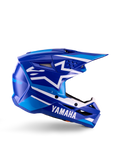 Casque de motocross Yamaha S-M3 Youth, bleu et blanc brillant, vue de profil avec marquage Yamaha imposant et logo étoile Alpinestars, design géométrique avec accents bleu clair, coque ventilée avec longue visière, protection certifiée ECE 22.06