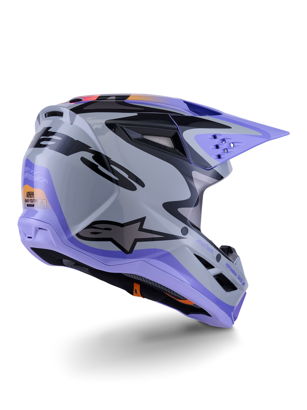 Casque Alpinestars S-M3 Jettson Junior, casque de motocross, gris, violet et noir brillant, vue de trois-quarts arrière, doté d'une visière violette, d'un logo Alpinestars noir et de multiples orifices de ventilation, design épuré pour la compétition tout-terrain junior