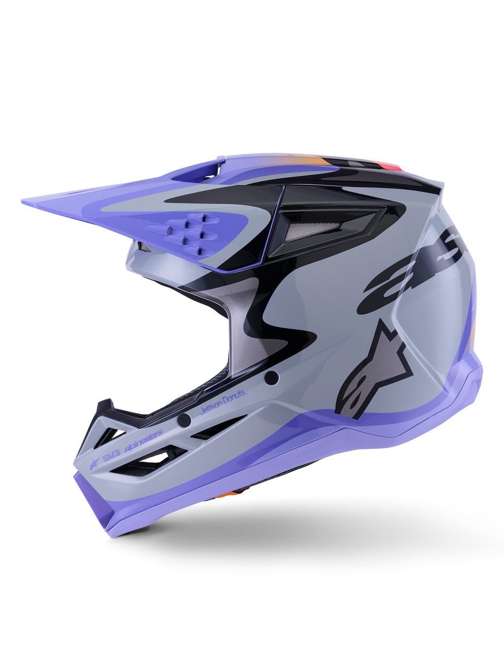Casque Alpinestars S-M3 Jettson, casque de motocross, gris, violet et noir brillant, vue de profil avec graphismes élégants et visière réglable, doté de multiples ports de ventilation et du logo Alpinestars, protection tout-terrain haute performance