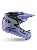 Casque Alpinestars S-M3 Jettson ECE 22.06, casque de motocross, gris, violet et noir brillant, vue de profil avec visière et mentonnière violettes, coque aérodynamique avec graphismes noirs, multiples aérations et marquage « Jettson Donuts » sur le côté.