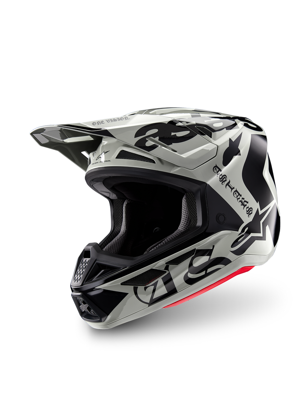 Alpinestars Limited Edition S-M7 Wolf Dust Helm, motorcrosshelm, Dune Black Glossy, lichtgrijze schaal met zwarte gotische 'ASTARS' belettering en sterlogo, rood accent aan de onderrand, voorzien van een hoogwaardig vizier en meerdere ventilatieopeningen, driekwart vooraanzicht