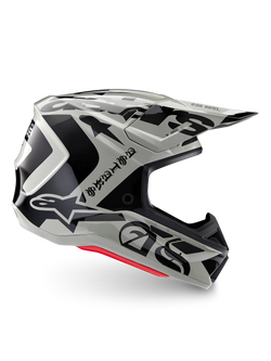 Alpinestars Limited Edition S-M7 Wolf Dust Helmet, Dune Black Glossy motocross helmet, side profile featuring bold black graphics and branding, red base accents, aerodynamic off-road head protection