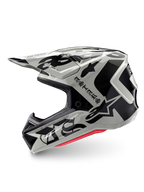 Alpinestars Limited Edition S-M7 Wolf Dust helm, motorcrosshelm, Dune Black Glossy, gebroken witte schaal met zwarte gotische ASTARS-branding en grafische patronen, rode binnenvoering zichtbaar, aerodynamisch profiel voor off-road racen