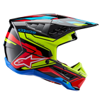 Alpinestars S-M5 Action 2 Helmet ECE, Motocross Helmet, Glossy Black with Yellow Fluo, Bright Red, and Cyan Blue graphics, profile view featuring an aerodynamic shell, ventilated peak, and prominent Alpinestars branding on the side, professional off-road racing protection