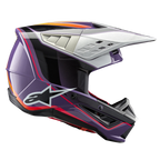 Alpinestars S-M5 Sail Helm ECE, motorcrosshelm, paars, zwart en zilver glanzend, met opvallende oranje en rode graphics, zilver geventileerd vizier, aerodynamische schaal met wit sterlogo, professionele off-road racebescherming