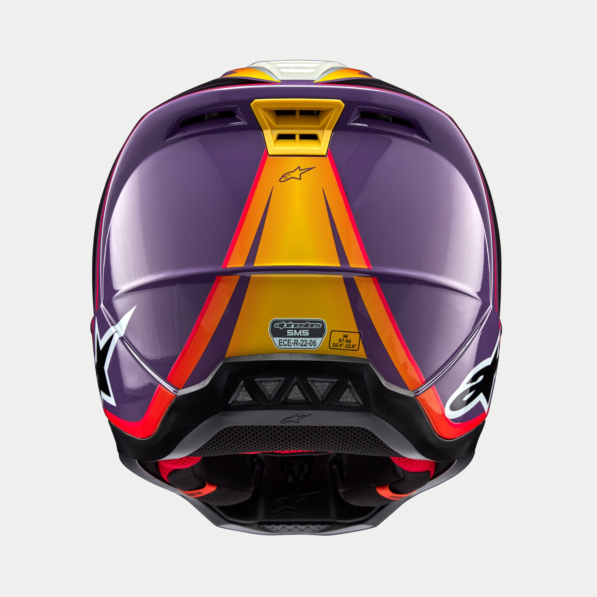 Alpinestars S-M5 Sail ECE helm, motorcrosshelm, violet zwart zilver glanzend, achteraanzicht met oranje en gele gradiëntafbeeldingen op een violette schaal, glanzende afwerking met witte sterlogo's aan de zijkanten, ventilatieopeningen en ECE-certificeringslabel.