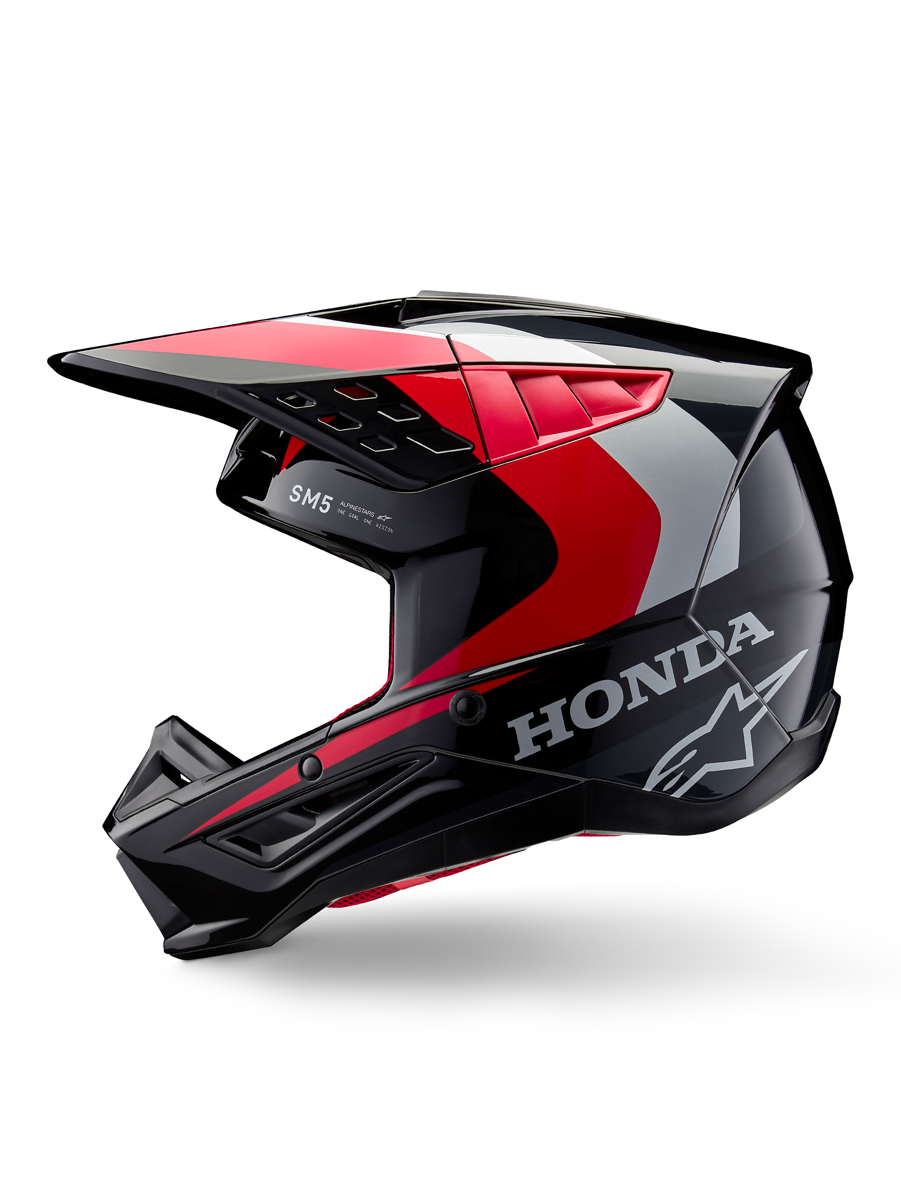 Casque Alpinestars Honda S-M5, casque de motocross, noir, rouge et argent brillant, vue de profil avec logos Honda et Alpinestars, design profilé avec visière intégrée et ports de ventilation pour la performance tout-terrain