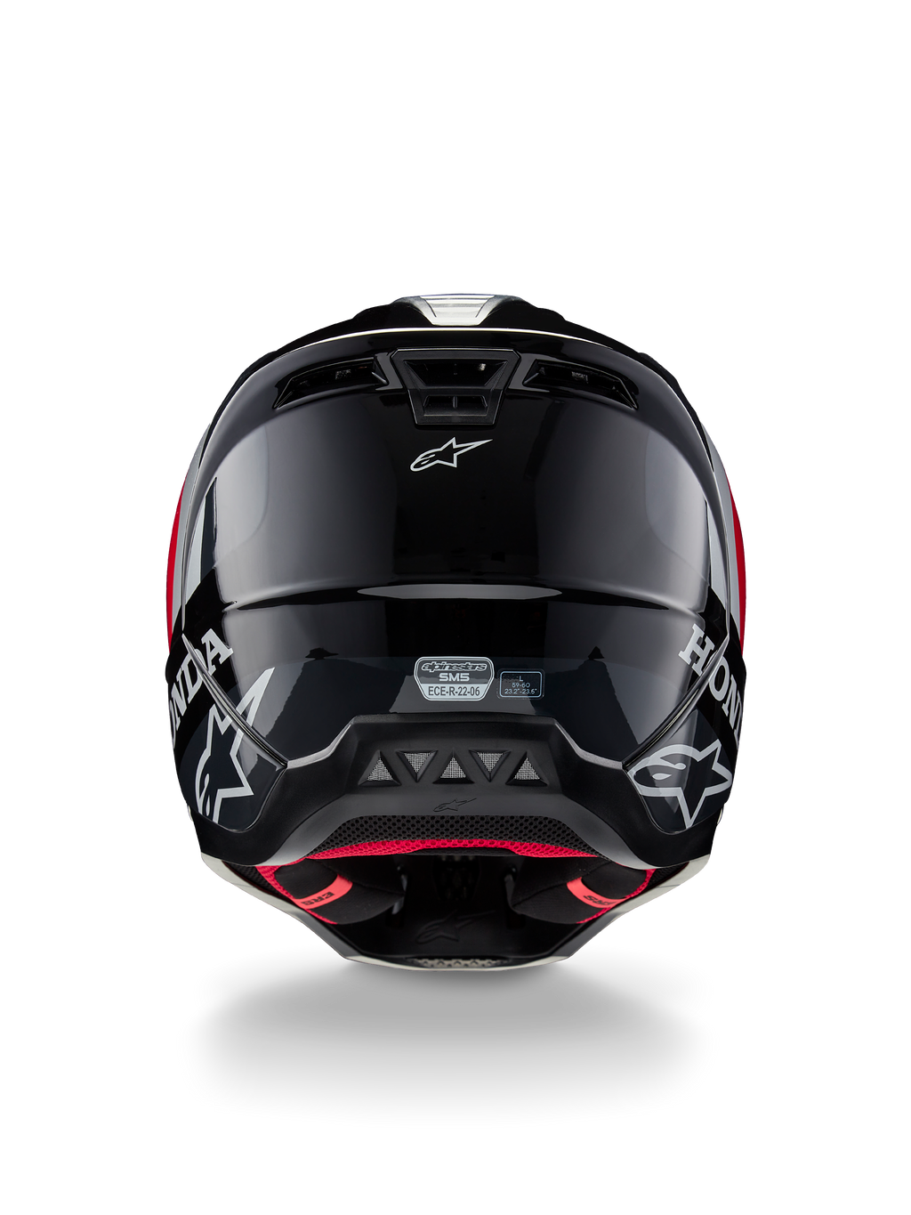 Casque Alpinestars Honda S-M5 ECE, casque de motocross, noir et rouge brillant, vue arrière montrant la coque noire brillante avec les logos Honda et Alpinestars blancs, la doublure intérieure rouge et l'étiquette de certification de sécurité ECE