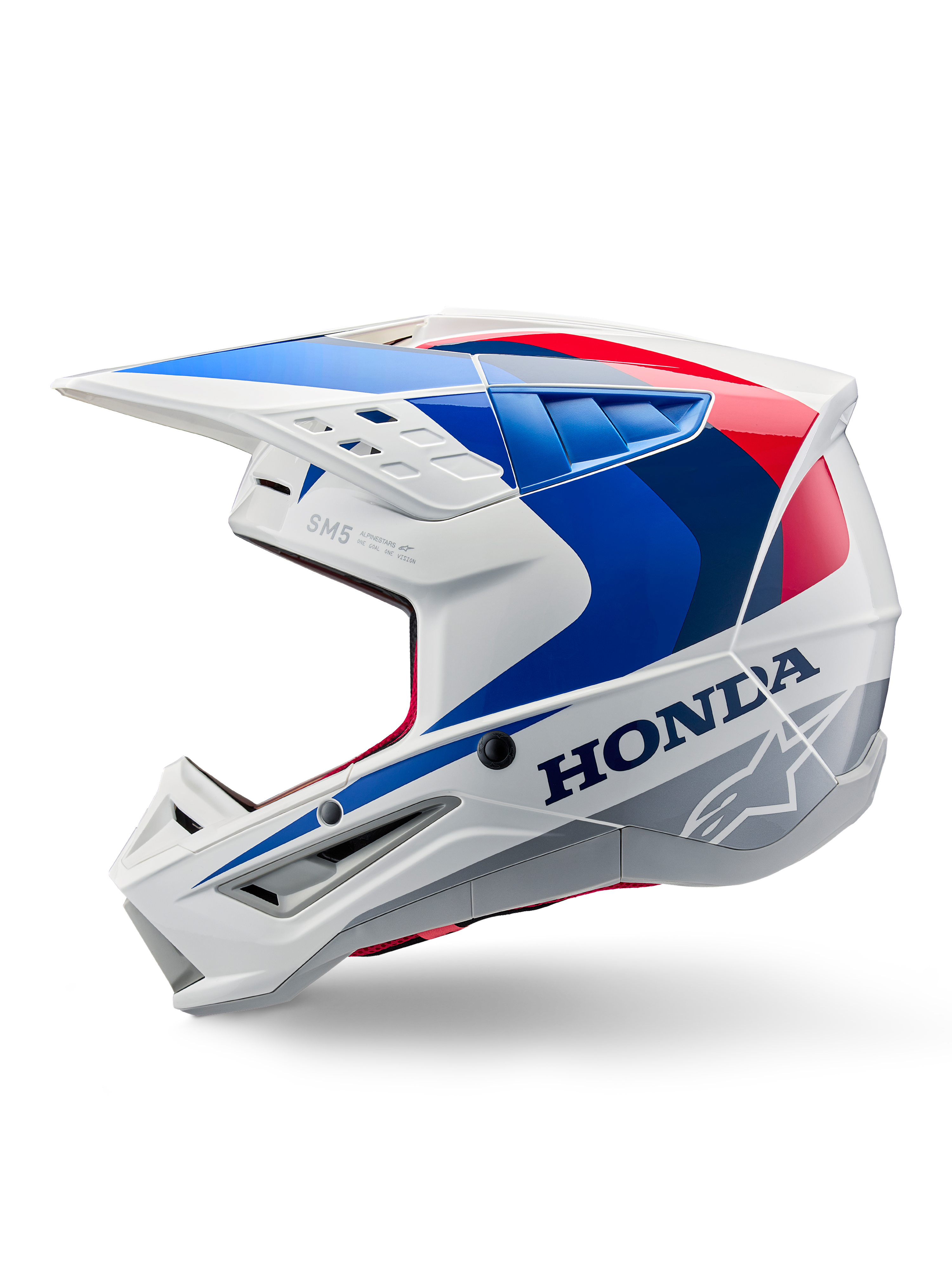 Alpinestars Honda S-M5 Helm ECE, wit blauw rood glanzend, zijaanzicht, met opvallende Honda-branding en Alpinestars-sterlogo, aerodynamisch motorcross-ontwerp met meerdere ventilatieopeningen en een prominent vizier, glanzende afwerking