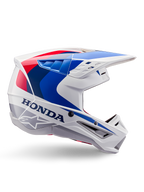 Alpinestars Honda S-M5 helm ECE, motorcrosshelm, wit, blauw en rood, zijaanzicht, aerodynamisch ontwerp met geïntegreerd vizier, meerdere ventilatieopeningen, glanzende afwerking, opvallende Honda branding en Alpinestars logo