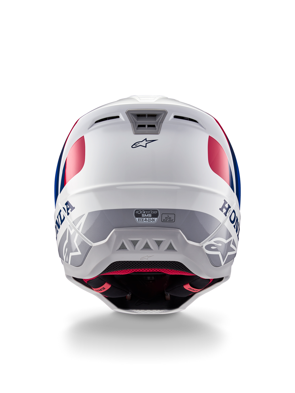 Alpinestars Honda S-M5 ECE-helm, motorcrosshelm, wit, blauw en rood glanzend, achteraanzicht met Honda- en Alpinestars-logo's, gestroomlijnde schaal met geïntegreerde ventilatieopeningen en ECE-certificeringslabel.