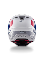 Alpinestars Honda S-M5 ECE-helm, motorcrosshelm, wit, blauw en rood glanzend, achteraanzicht met Honda- en Alpinestars-logo's, gestroomlijnde schaal met geïntegreerde ventilatieopeningen en ECE-certificeringslabel.