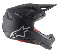 Alpinestars Missile Tech Solid Helm, mat zwart, full-face downhill MTB-helm met zilveren logo en mesh ventilatie.