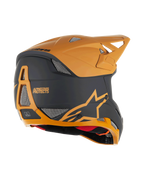 Alpinestars Missile Tech Racer helm, full-face MTB-helm, zwart en mat donkergoud, achteraanzicht met mesh ventilatieopeningen, aerodynamisch vizier en Alpinestars Protects-branding op de achterkant, professionele bescherming voor downhill mountainbiken.