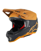 Alpinestars Missile Tech Racer helm, full-face MTB-helm, zwart en mat donkergoud, matte afwerking met goudkleurig sterlogo, rode binnenvoering, zilverkleurige mesh ventilatieopeningen voor luchtstroom, hoekig vizier, downhill mountainbike bescherming