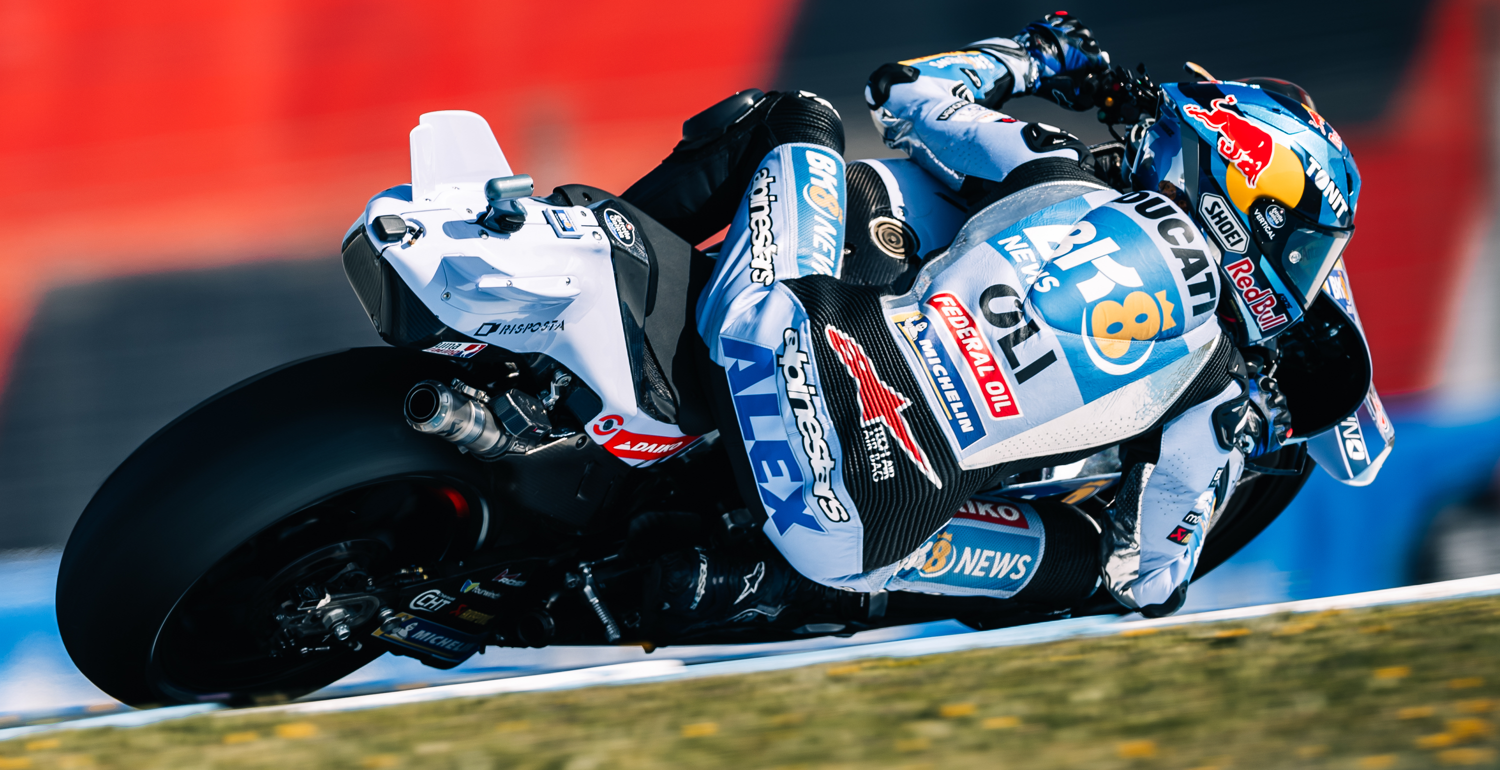 Close-up shot of Alex Marquez racing 