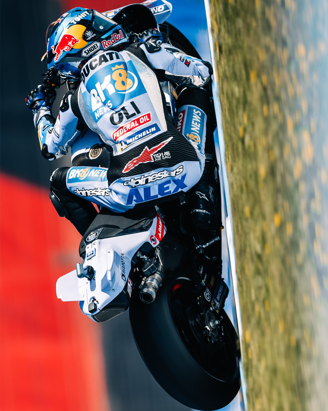 Close-up shot of Alex Marquez racing 