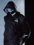 Alpinestars RSRV Axis Leather Hoodie, veste à capuche en cuir noir avec logo RSRV et étoile, manches ornées d'étoiles blanches, fermeture éclair, style urbain futuriste premium
