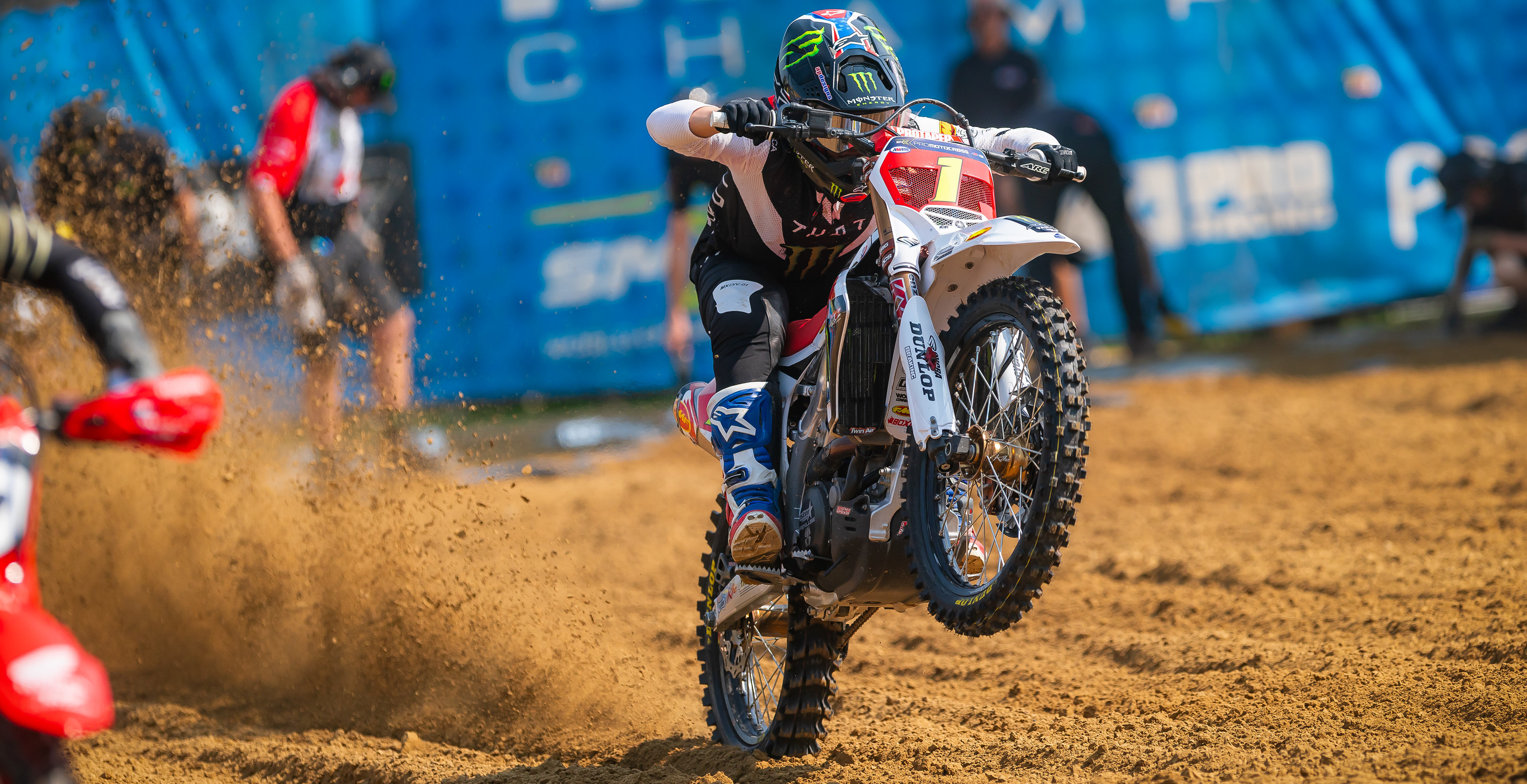 Haiden Deegan in action on a dirt track with a Monster Energy branded bike.