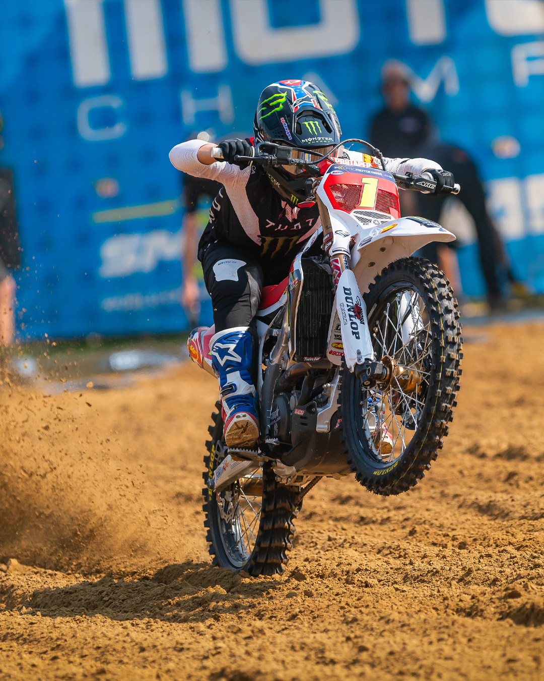 Haiden Deegan in action on a dirt track with a Monster Energy branded bike.