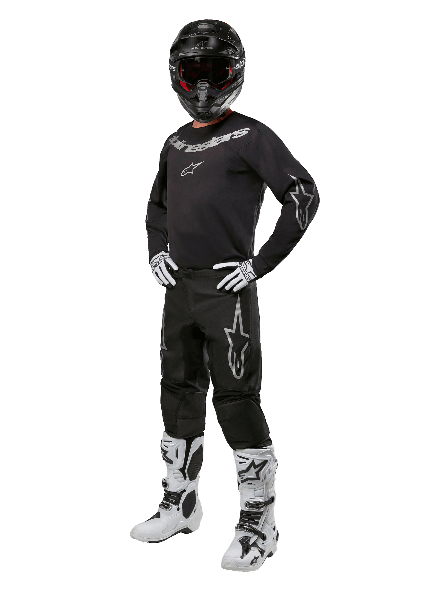 Alpinestars 2024 Fluid Graphite Gear Set, Complete Motocross Racing Outfit, Black with Gray and White Logos, featuring jersey and pants worn with matching black helmet, white and black gloves and boots, designed for off-road protection