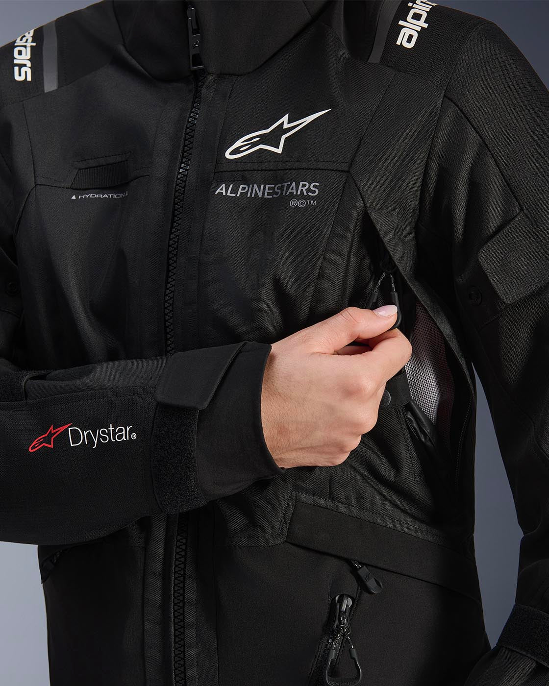 Alpinestars Stella Andes V4 Drystar Jacket, black and gray waterproof women's adventure jacket, side ventilation detail.