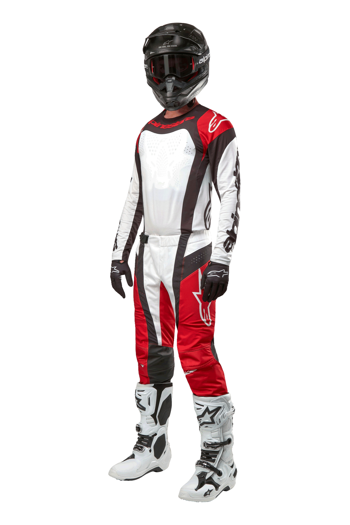 Pilote de motocross portant une tenue complète Alpinestars, pantalon Techstar Ocuri 2024 en rouge Mars, blanc et noir, maillot assorti, casque noir avec lunettes, gants noirs et blancs, et bottes de motocross blanches, tenue de course tout-terrain professionnelle