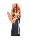Gants Alpinestars Tech-1 K V3, gants de karting, noir, orange et blanc, dotés d'un design graphique sublimé avec des motifs de coups de pinceau orange sur une base noire, grand logo Astar blanc sur le dessus, texte Alpinestars vertical sur la manchette, équipement de karting professionnel