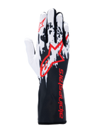 Alpinestars Tech-1 K V3 handschoenen, karthandschoenen, zwart wit rood, voorzien van een wit en zwart gespikkeld grafisch ontwerp op de rug, groot rood Alpinestars-logo, rode merkdetails op de lange manchet, professionele motorsportuitrusting