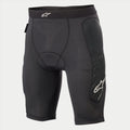 Alpinestars Youth Paragon Lite beschermshort, fietsbeschermingsshort, zwart, met ademend mesh-materiaal, geïntegreerde heupbescherming, wit Alpinestars-logo op de tailleband en het zijbeen, lichtgewicht beschermende ondershort voor MTB